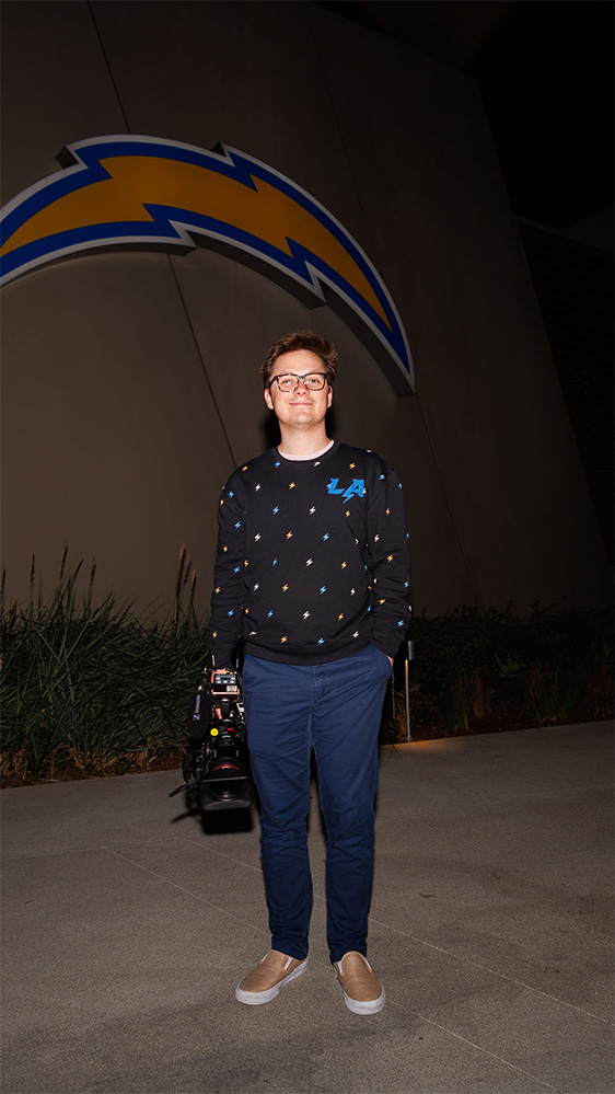 Bailey outside the Bolt at night, the training facility for the Chargers