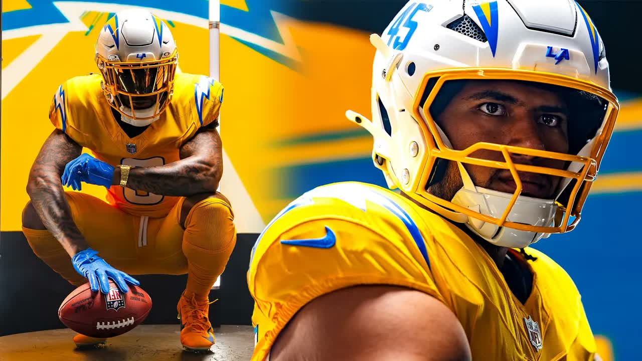 Tuli Tuipulotu and Derwin James posing in the new all gold uniforms
