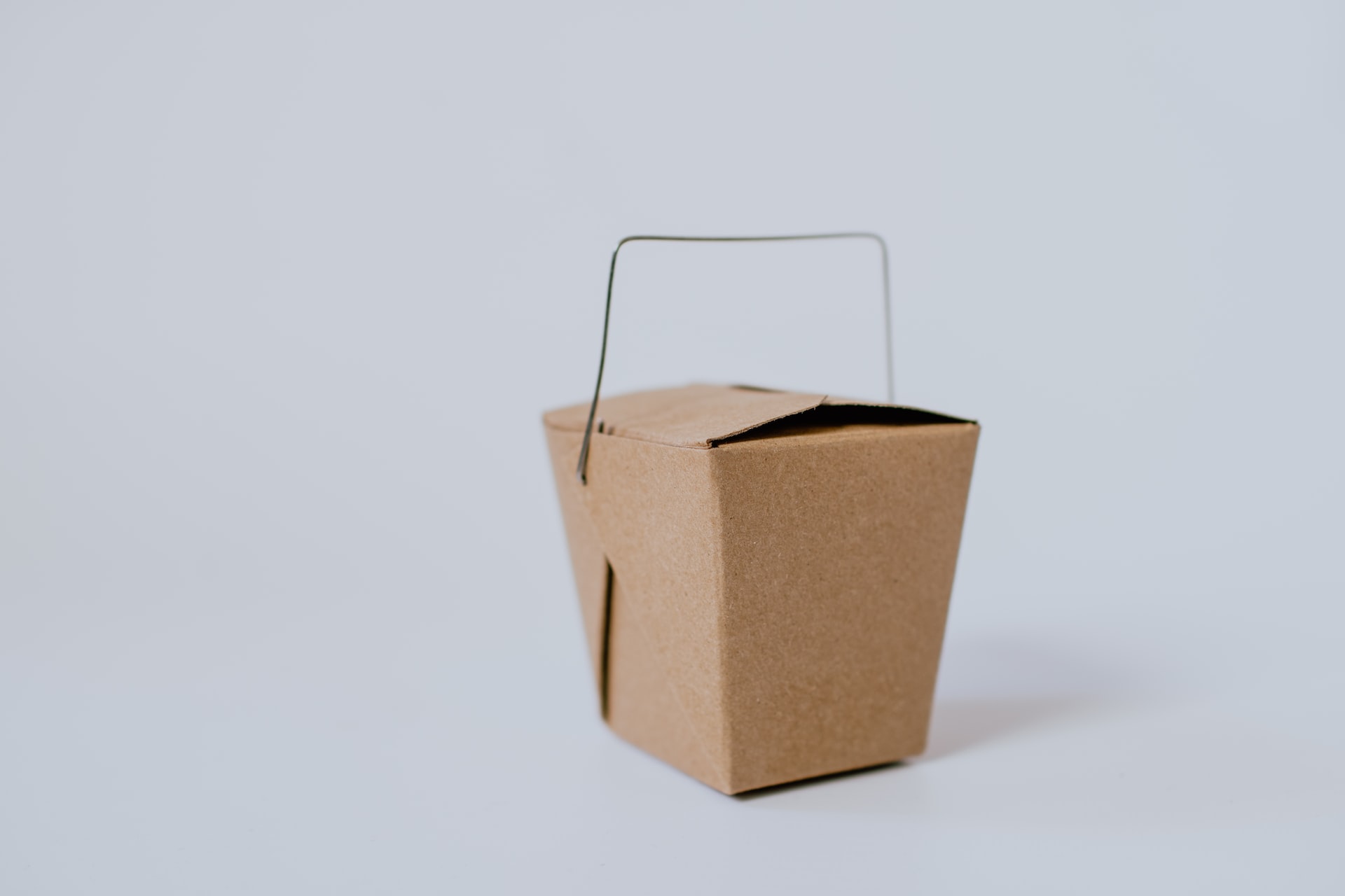 A brown takeout container